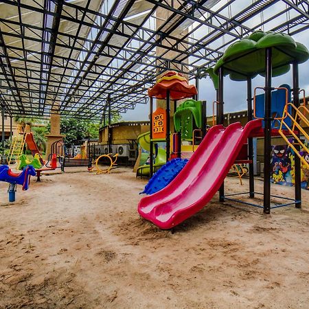 The Corinthians Resort And Club Púna Exteriér fotografie Playground at the resort